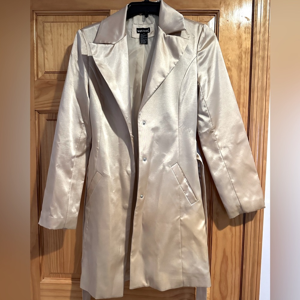 Gold satin jacket. Good condition. Slight imperfection